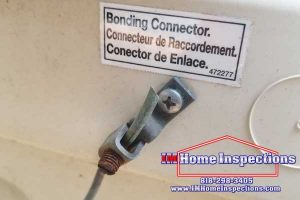 A bonding wire connected to a pool heater 